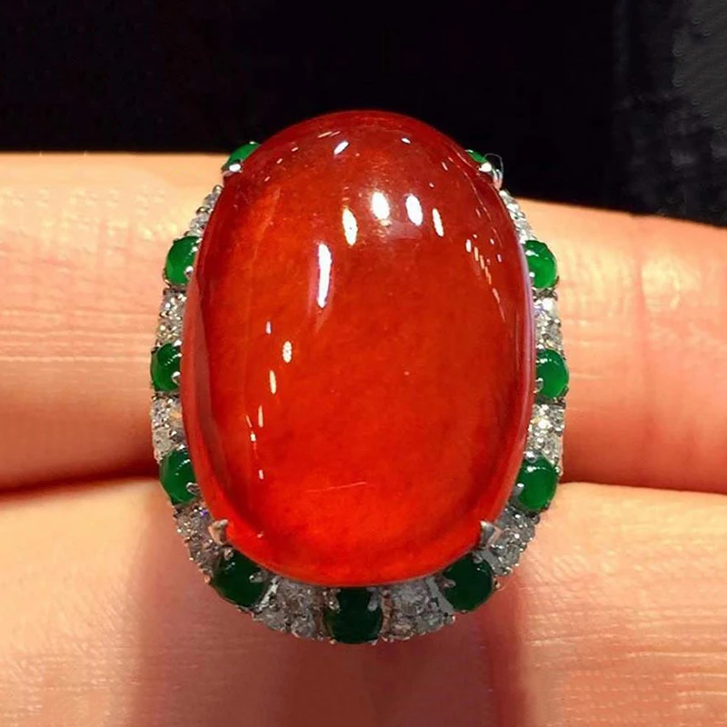 

Natural chalcedony Positive red oval large egg face ring opening adjustable Chinese style peculiar retro ladies jewelry