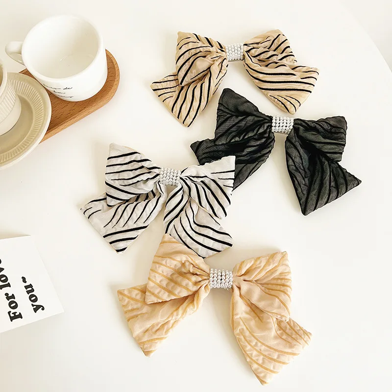 

2022 new mesh yarn black striped fold bow spring clip go out net red hit color word clip hairpin