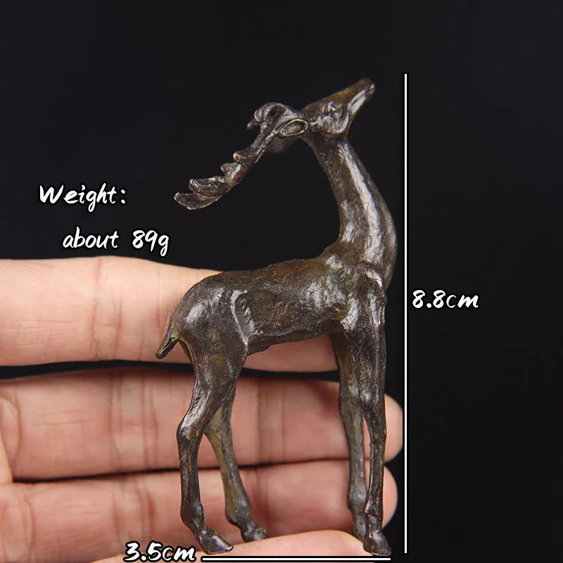 

Медные статуэтки оленей Sika