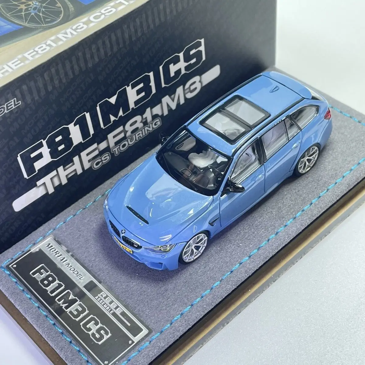 Фото Коллекционная модель автомобиля Mortal 1:64 BMW M3 F81 Crock Pot Hunting, перламутрово-белая, из сплава №2