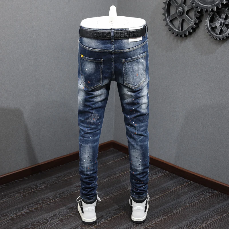 Newly Designer Fashion Men Jeans Retro Blue Elastic Embroidery Slim Ripped Jeans Men Hip Hop Painted Vintage Denim Pants Hombre