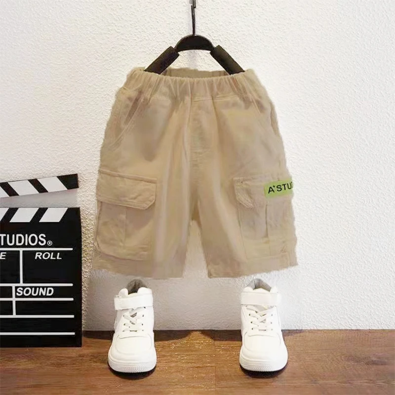 Свободные повседневные тонкие брюки с эластичным поясом и карманами однотонные