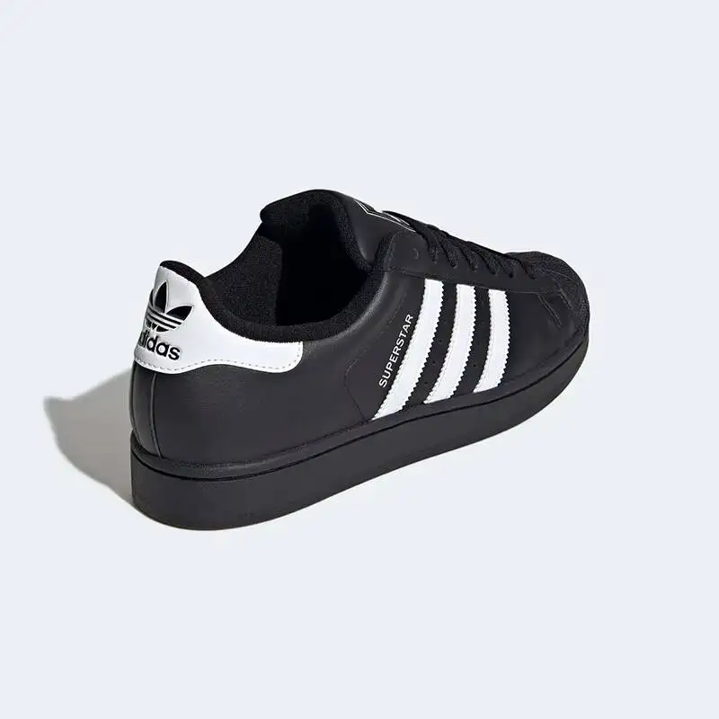 Фото Кроссовки Adidas JI0079 Icon Shell Toe, черно-белые, с тремя полосками, из премиальной кожи, с износостойкой резиновой подошвой, для повседневной ходьбы №4