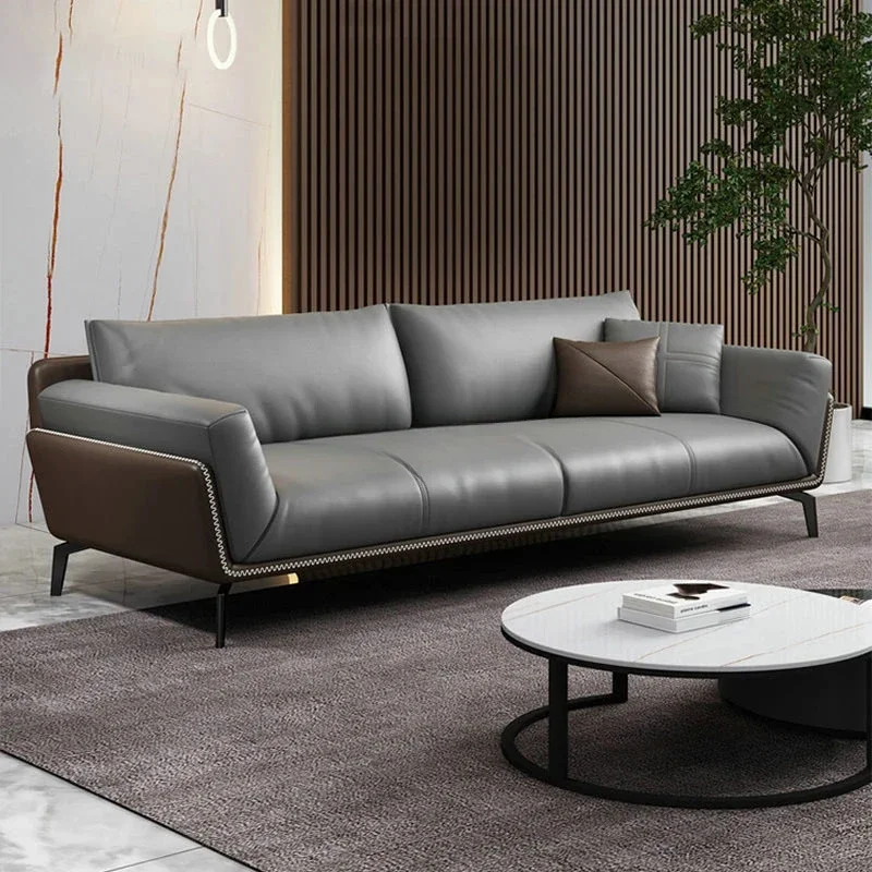 Сочетание кожаного минималистического дивана из воловьей кожи в западном стиле