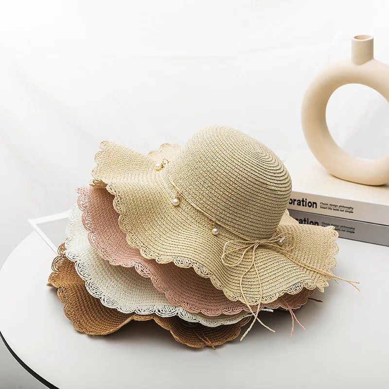 

Шляпа женская Соломенная с бантом и жемчугом, модная уличная Складная пляжная Панама с волнистыми боками, соломенная шляпа от солнца, весна-...
