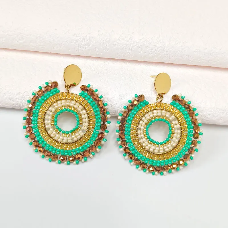 Серьги бусины в виде риса круглой формы с вырезами оригинальные ручные вязаные