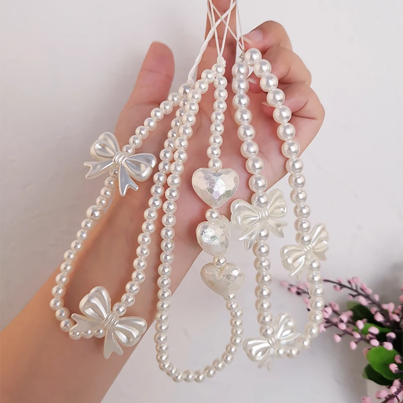 

Mobile Phone Lanyard Short Hand-beaded Wrist Chain Bow Jewelry Pendant Women's Exquisite Pendant Mobile Phone Anti-lost Lanyard