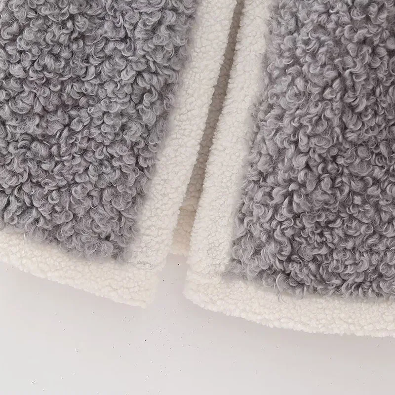 Женский зимний теплый жилет из овечьей шерсти