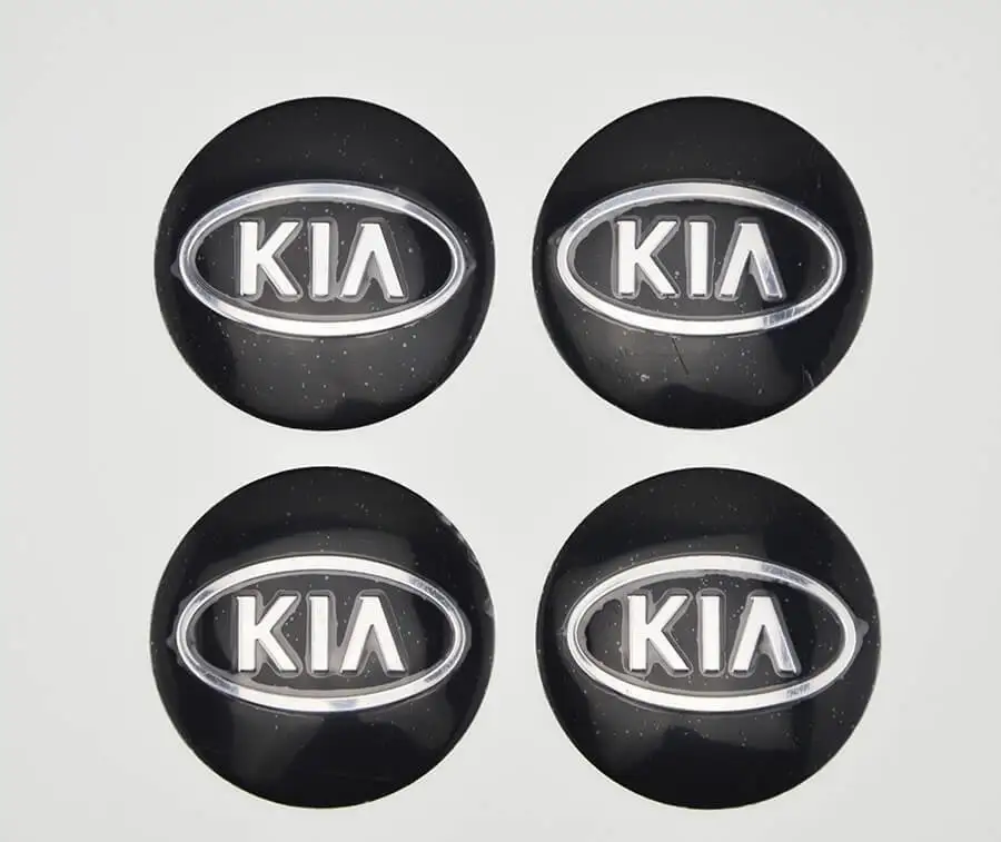 Наклейка на центральное отверстие диска kia