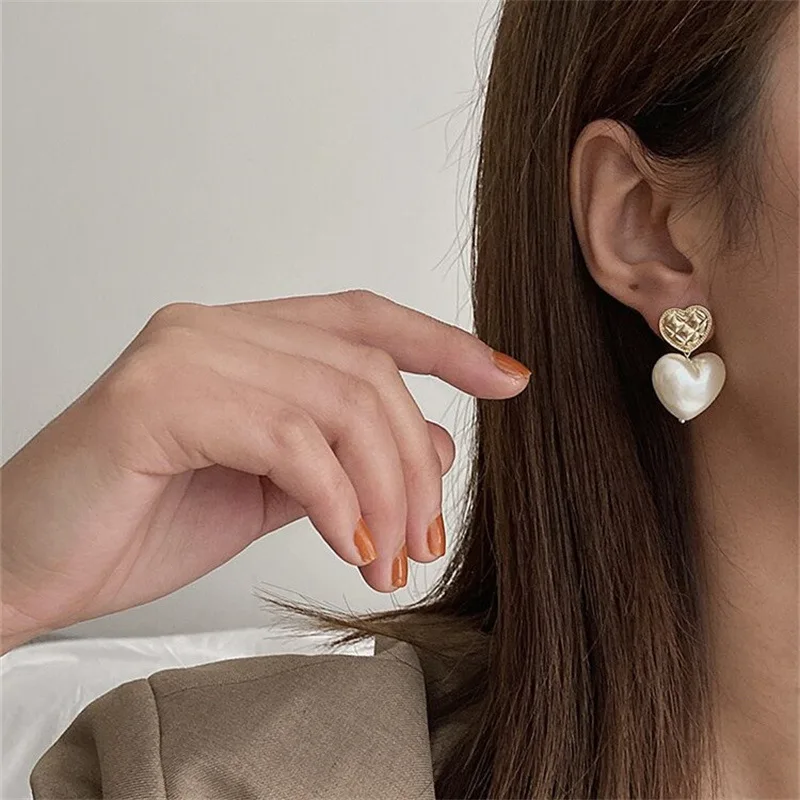 

Tongfang ювелирные изделия Han Xiaobiao Индивидуальные Модные индивидуальные Серьги Love с температурным жемчугом Симпатичные серьги Женская простот...