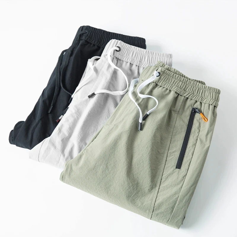 

Мужские свободные прямые тонкие повседневные брюки, корейские шелковые дышащие брюки со шнуровкой, брюки на молнии с карманами, Новинка лета 2023
