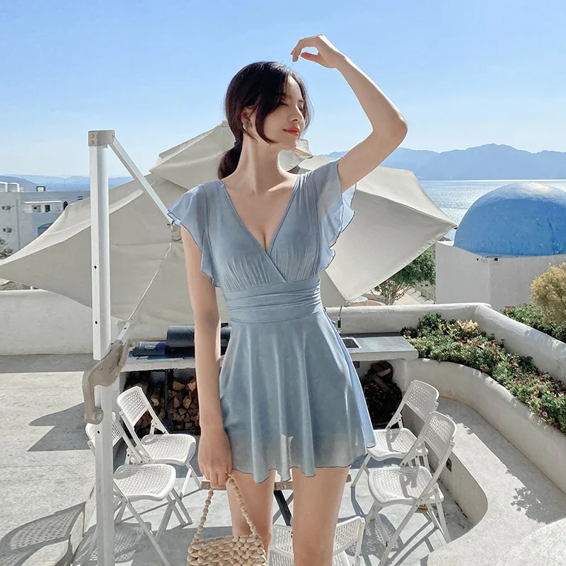 

Купальник женский однотонный с чашками пуш-ап и открытой спиной