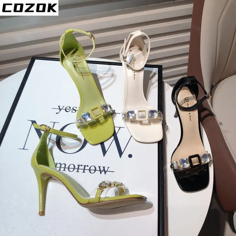 

Show White Temperament High Heels 2022 New Summer New Fairy Feng Shui Drill Square Head Word Buckle Stiletto Transparent Sandals