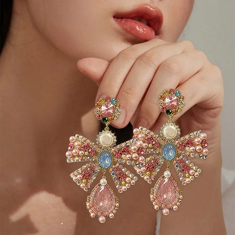 

Korean Luxury Pink Rhinestone Bowknot Drop Earrings for Women Fashion Waterdrop Crystal Pendientes Party Jewelry korean fashion