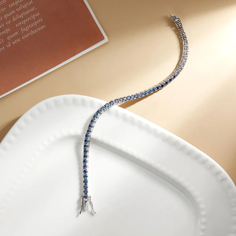 Браслет унисекс из серебра 925 пробы с голубым муассанитом 3/5 мм