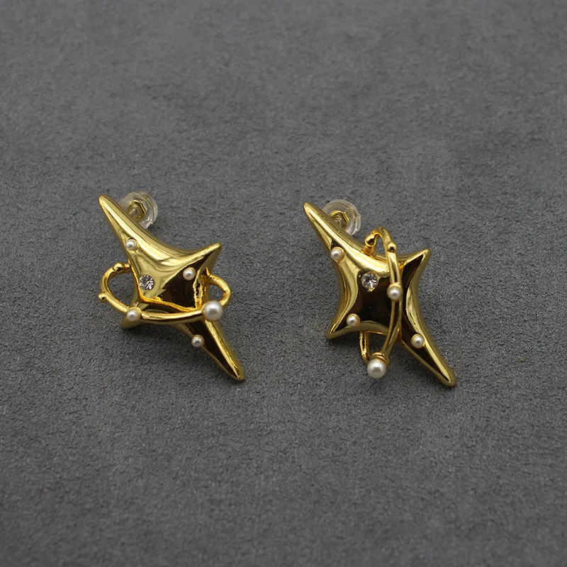 

Серьги в форме звезды с четырьмя острыми звездами