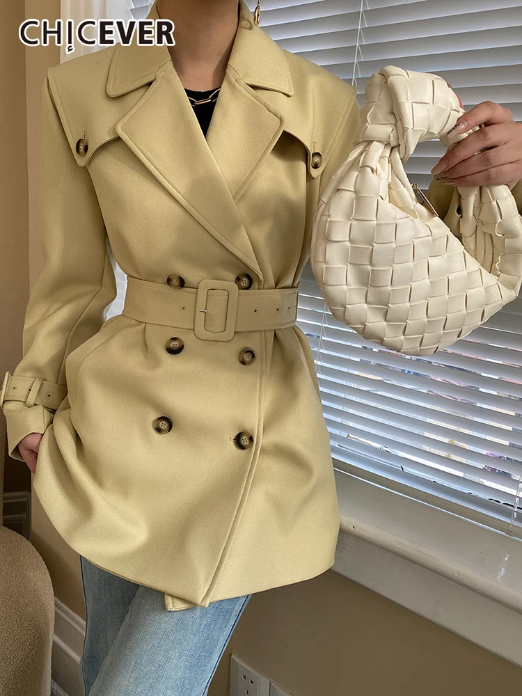 

TWOTWINSTYLE Streetwear Solid Coats For Women Notched Collar Long Sleeve Double Breasted Patchwork Belt Trench Female Clothing