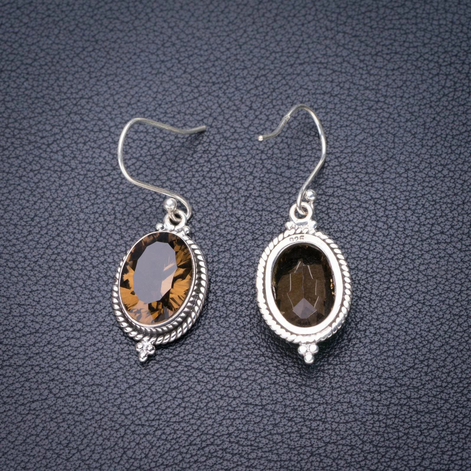 

Серьги из серебра 1,5 пробы с натуральным дымчатым кварцем