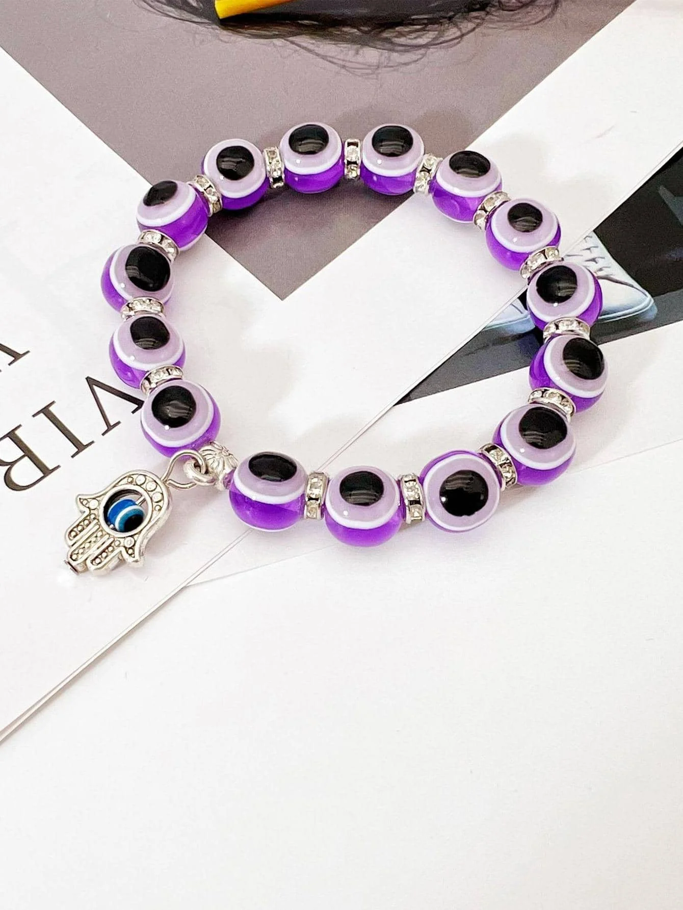 

Evil Eyes Resin Hand Charm Beaded Bracelet for Women
