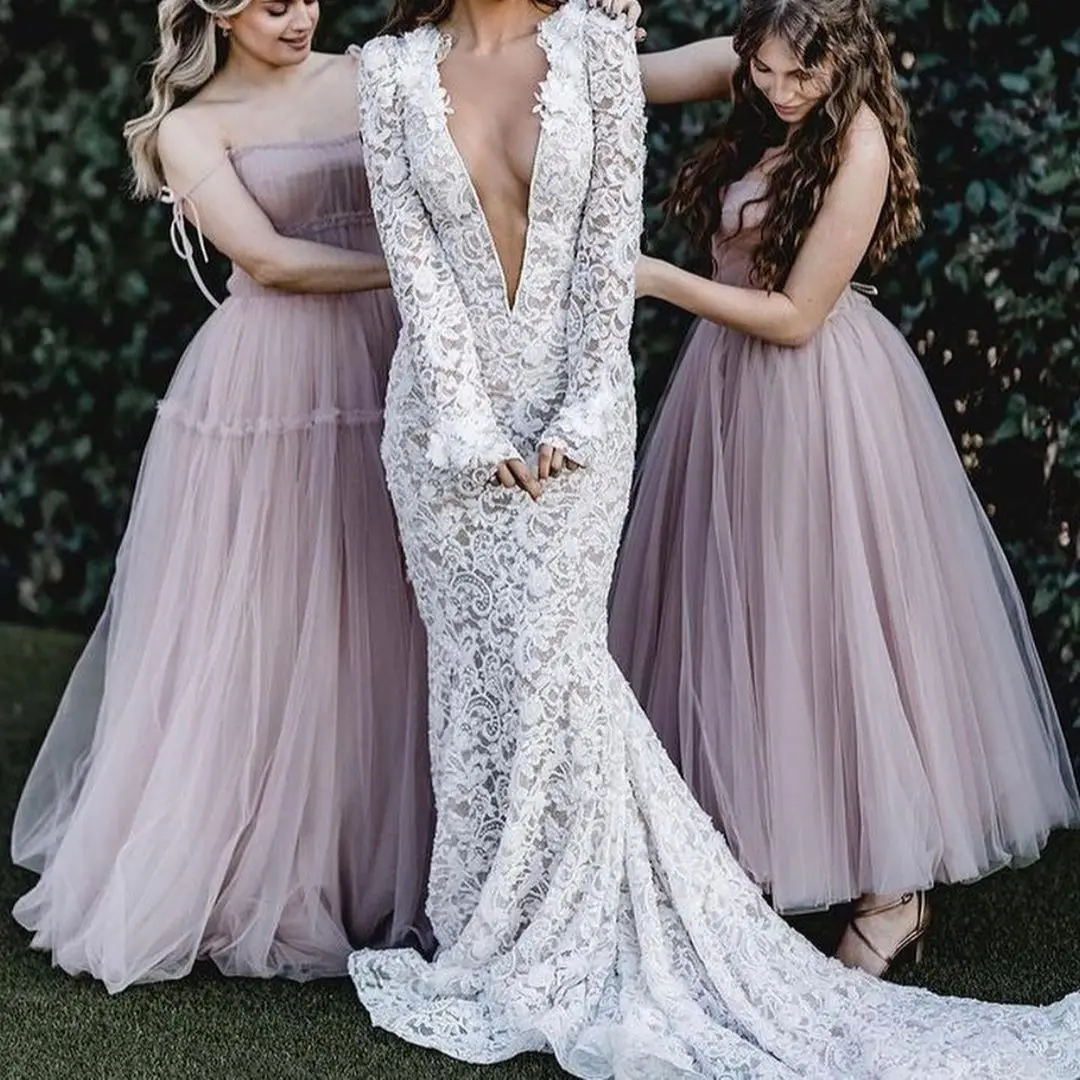 

FATAPAESE Fitted Long Sleeved Lace Dress Featuring a Deep Plunge that is Covered in Illusion Fabric Fully Embroidered Bride Gown