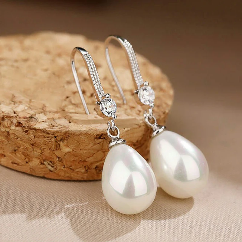 

Женские серьги-подвески с искусственным жемчугом