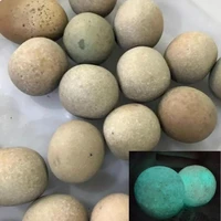 1pcs natural luminous stone luminous pearl raw stone irregular spherical luminous stone raw stone luminous stone send base