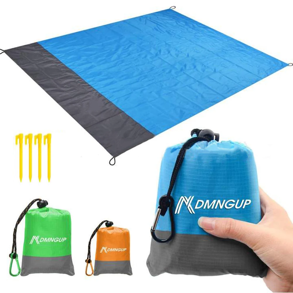 

Beach Blanket Sandproof Extra Large Beach Mat Big & Compact Sand Free Mat Quick Drying Lightweight & Durable with 6 Stakes & 4 C