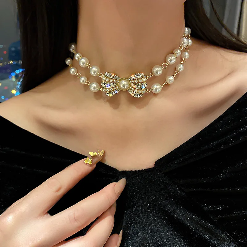 

Popodion Bow Pearl Collarbone Chain Necklace CHD20707