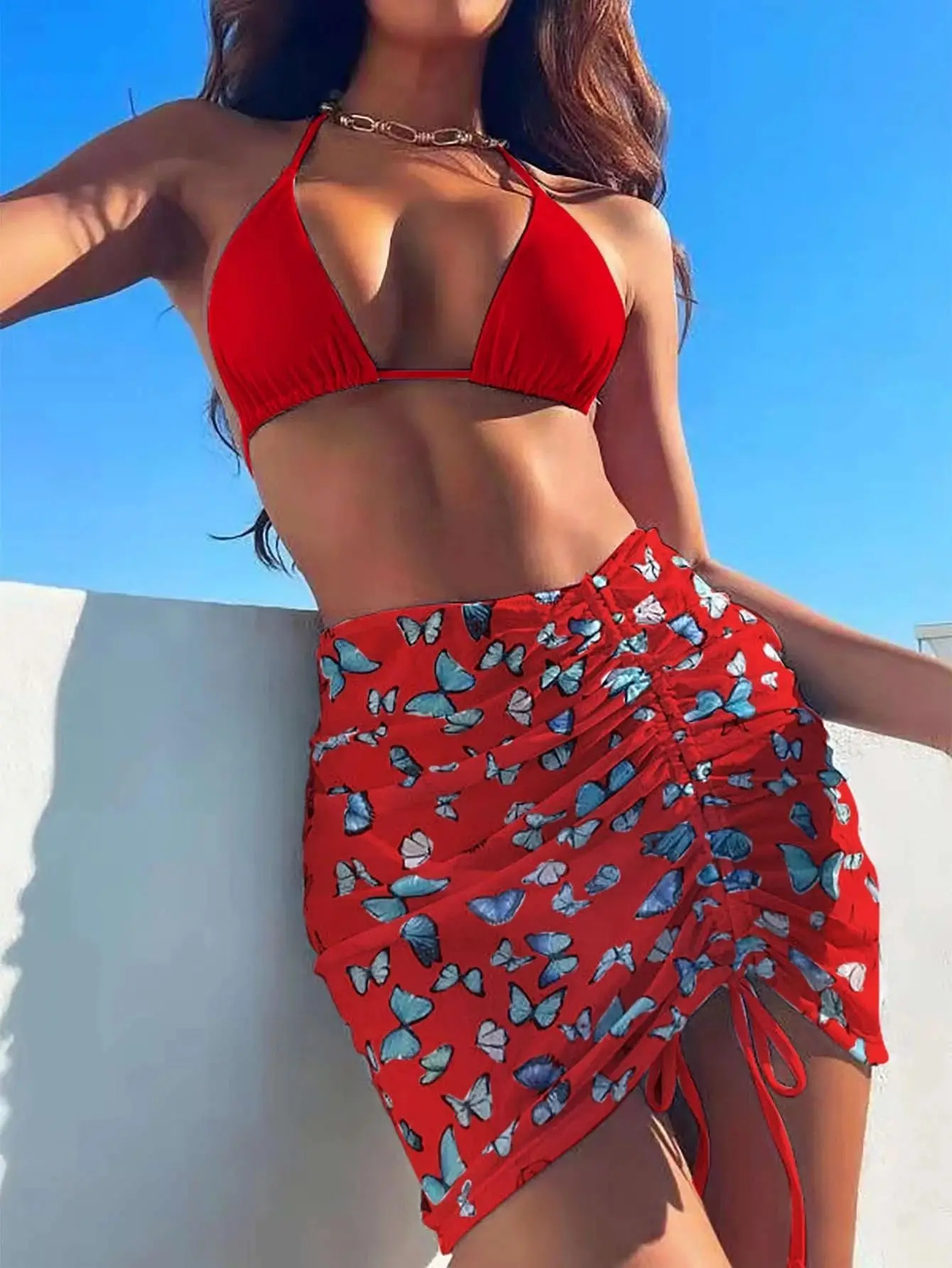 

Новинка 2022, комплект бикини из трех предметов, Однотонный женский купальник с треугольными лямками, пляжная юбка, прозрачная лямка через ше...