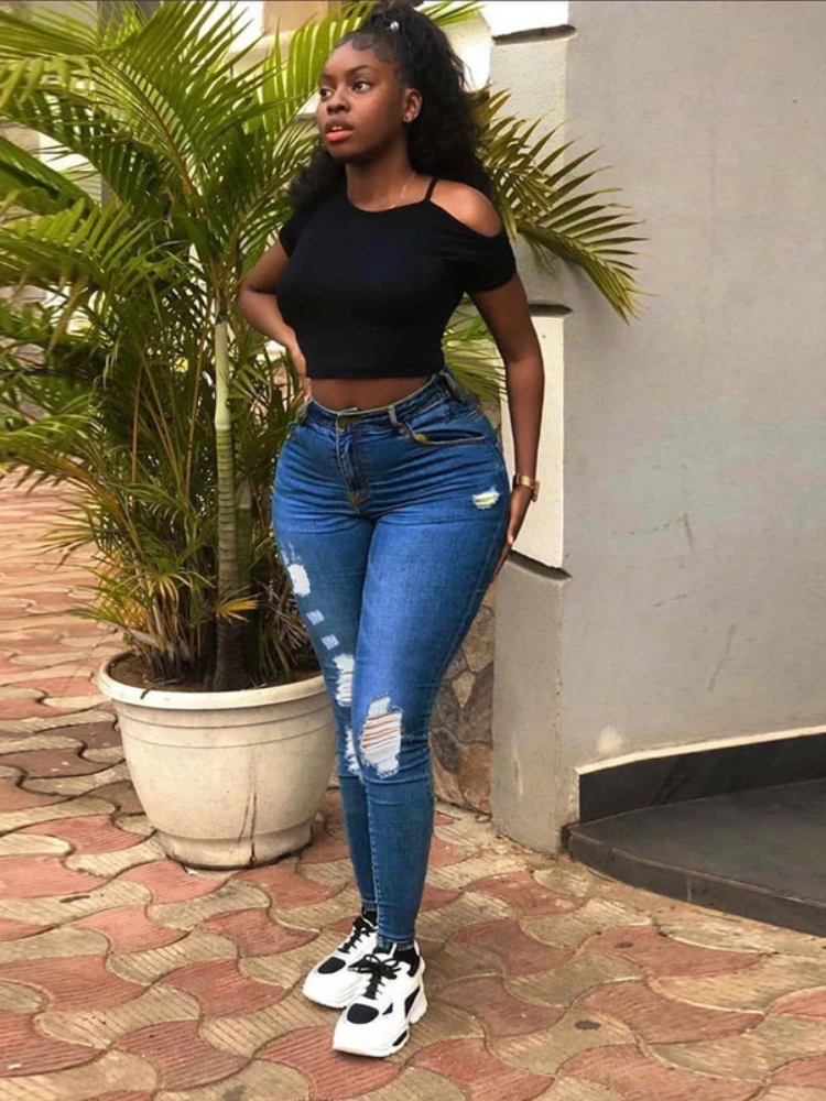 

2022 Spring and Summer New Fashion Commuter Slim Fit Irregular Washed Ripped Women's Jeans Solid Color Super Stretchy Jeans