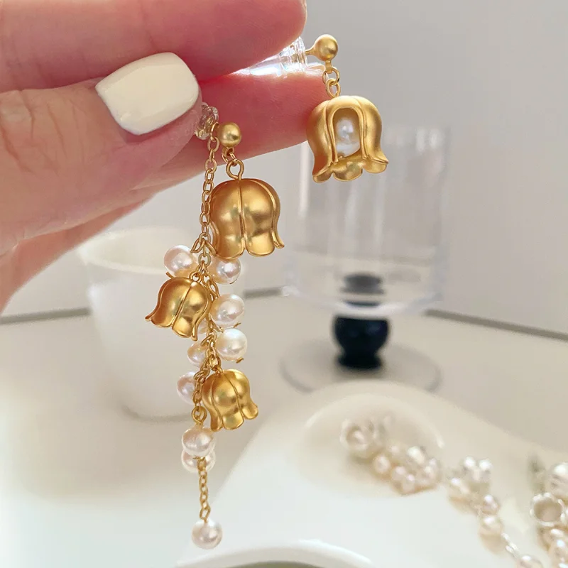 

Minar Romantic Freshwater Pearl Flower Asymmetric Tassel Earring for Women Gold Plated Brass Lily of The Valley Drop Earrings