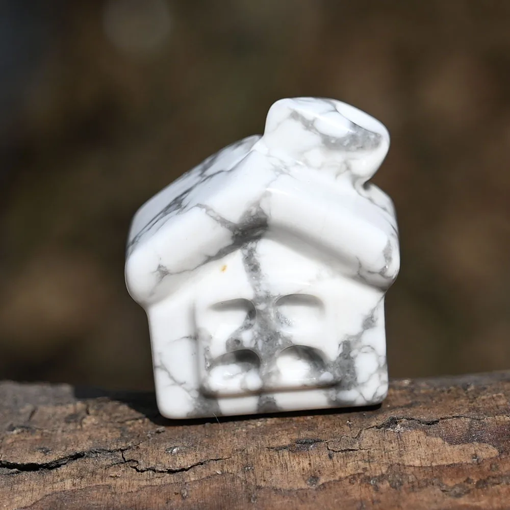 

Миниатюрная статуя дома из розового кварца и аметиста