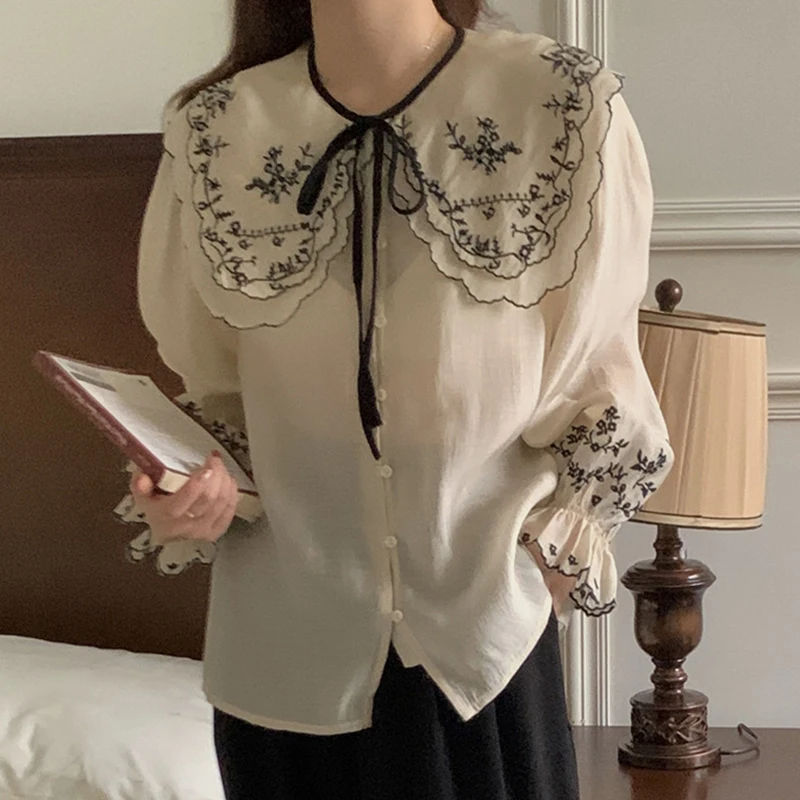 

Clothland Women Sweet Floral Embroidery Blouse Ruffles See Through Shirt Casual Office Wear Spring Tops Blusa Mujer LA695