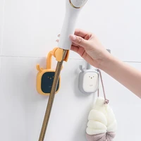 cute shower head holder punch free adjustable 360%c2%b0shaking head universal bathroom shower mounting brackets household accessories
