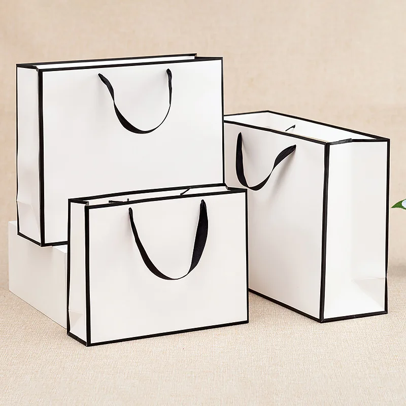 

24pcs/Lot Portable Paper Bag Gift Shop Hand Paper Bag Clothes Gift Bag Party Present Bag Jewelry Packaging Bag Fashion