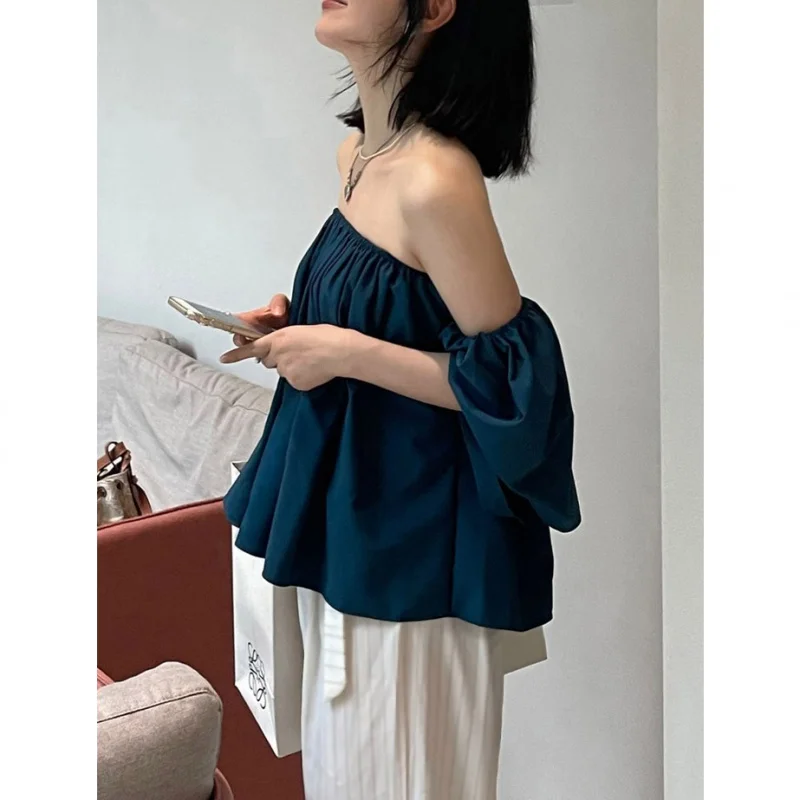 

Resort style one-line neck off-the-shoulder slimming top shirt