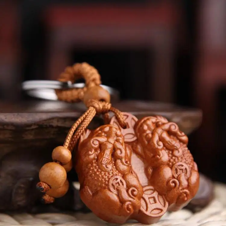 

Двойной кулон Pixiu из персикового дерева