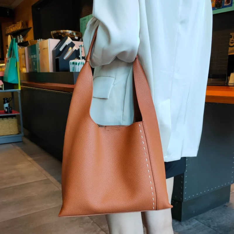 

Women's new fashion genuine leather tote bag high-capacity commuter bag advanced design shoulder underarm bag slung handbag