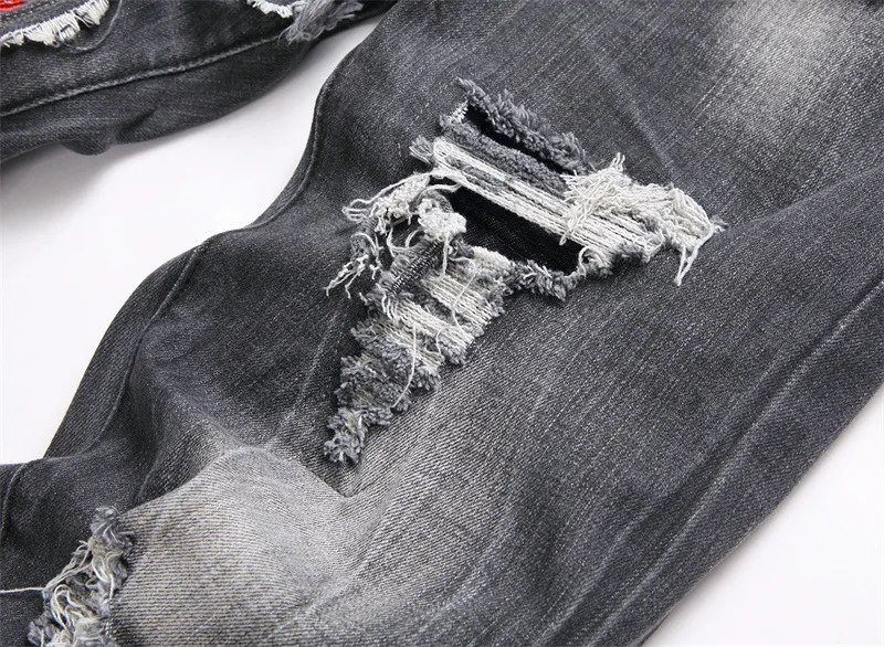 Джинсы женские рваные с вышивкой черепа в стиле панк