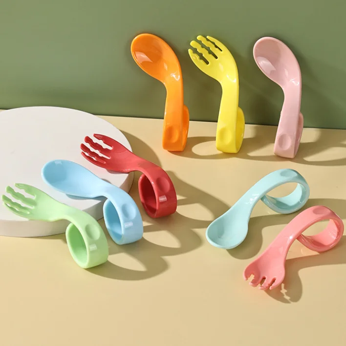 

2Pcs/set Baby Curved Fork Spoon Set Toddler Infant Learning Feeding Spoon Fork Kids Tableware Baby Gadgets Infant feeding spoon