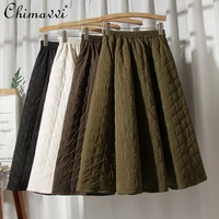 womens winter new quilted skirt korean style high waist a line skirt female pocket warm large swing umbrella mid length skirt