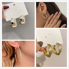 Новинка, модные серьги-кольца золотого цвета, металлические женские серьги, полые геометрические эффектные необычные серьги 2022, трендовая бижутерия для женщин