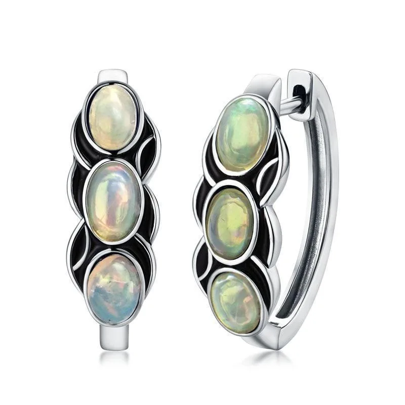 

Japanese and Korean Minority Design Moonlight Stone Advanced Sense Earrings Simple Temperament Design Sense Earrings Female