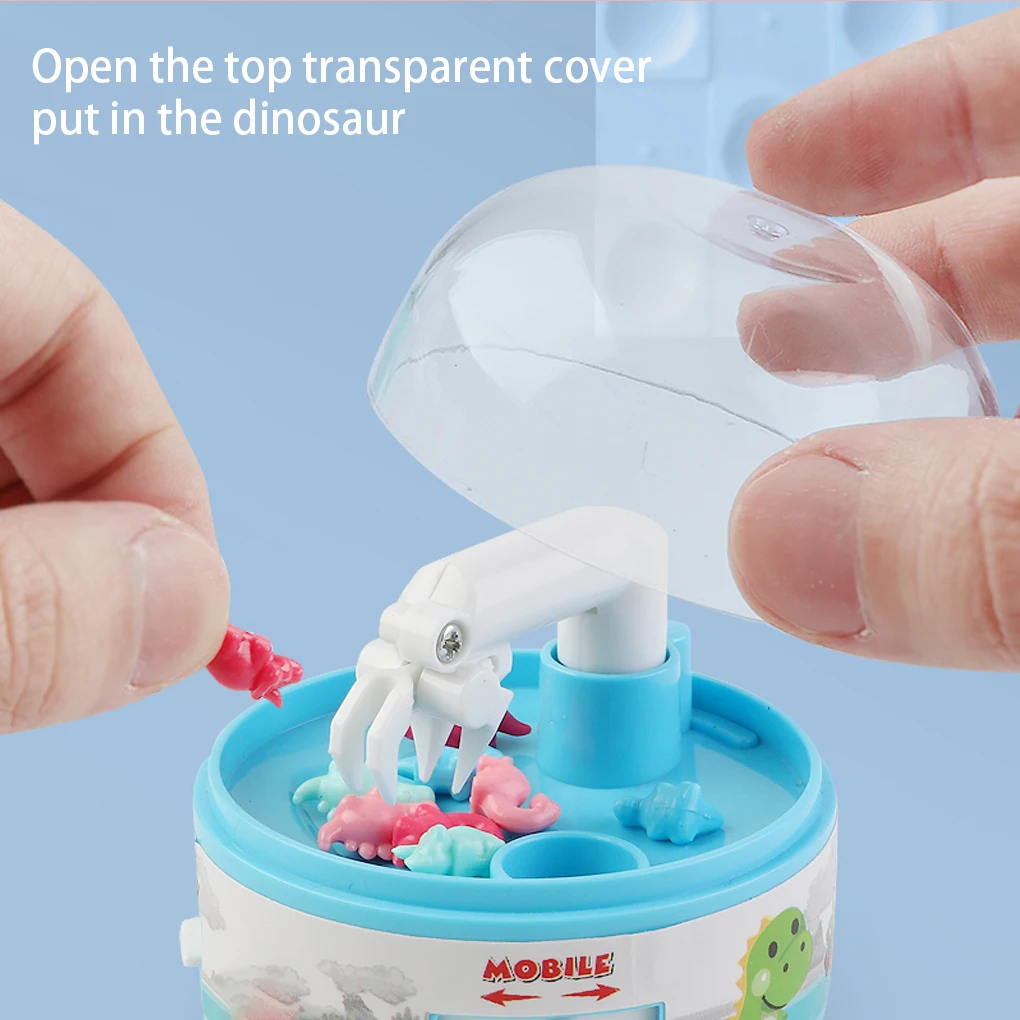 

Mini Claw Machine Children's Toys Dinosaur Grabbing Machine Capsule Grabbing And Grabbing Capsule Machine Interactive Toys