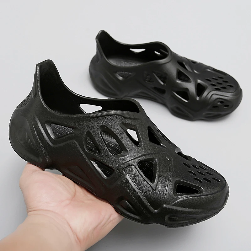 

WSNG Large Size Summer New One Pedal Coconut Hole Sandals Roman Beach Shoes Soft Bottom Comfortable Casual Sandals Men's Shoe45s