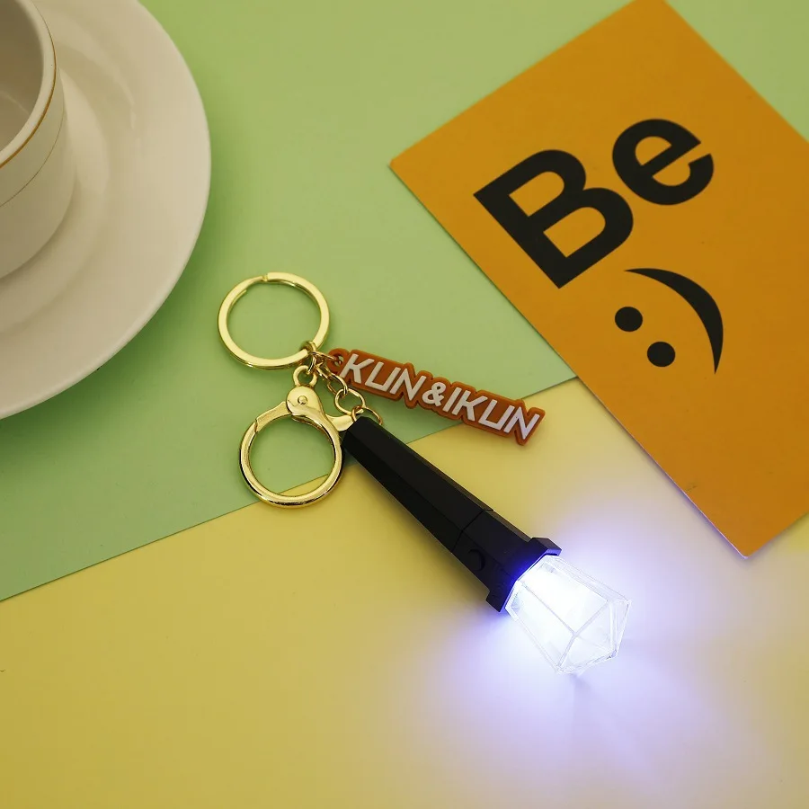 

New creative fashion BP IKUN aid light rose light with battery multi-color light keychain bag pendant around the same paragraph
