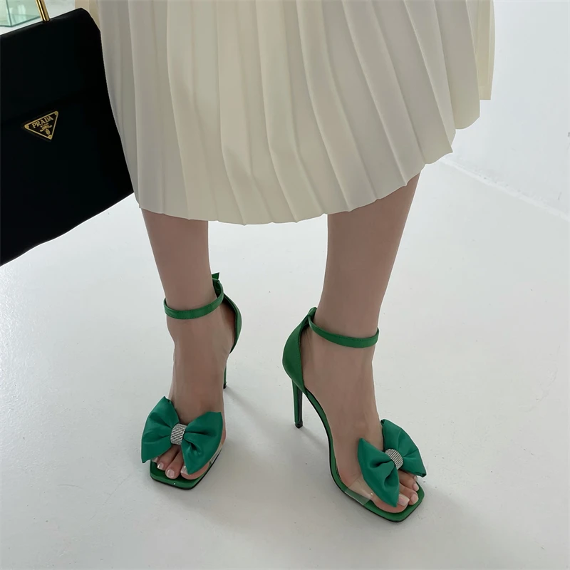 

Сандалии на шпильке 10 см с большим бантом женские высокие каблуки стразы черные офисные туфли летние зеленые вечерние туфли женские сандал...