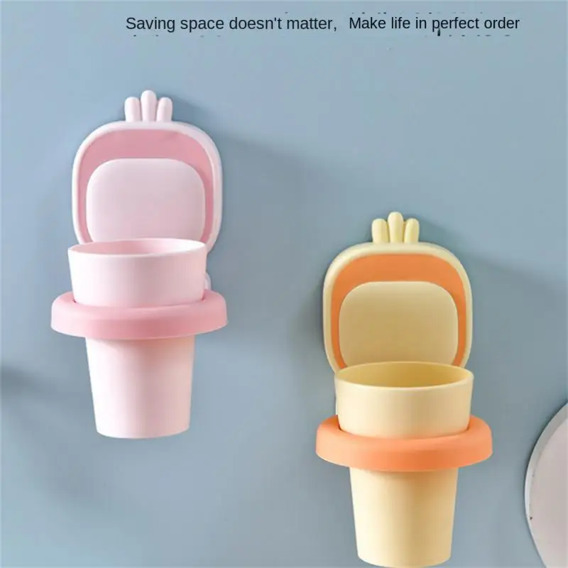 

Firmly Adsorb The Wall Surface Water Cup Toothbrush Storage Rack Strong Bearing Capacity Easy To Grip Toothbrush Cup Holder