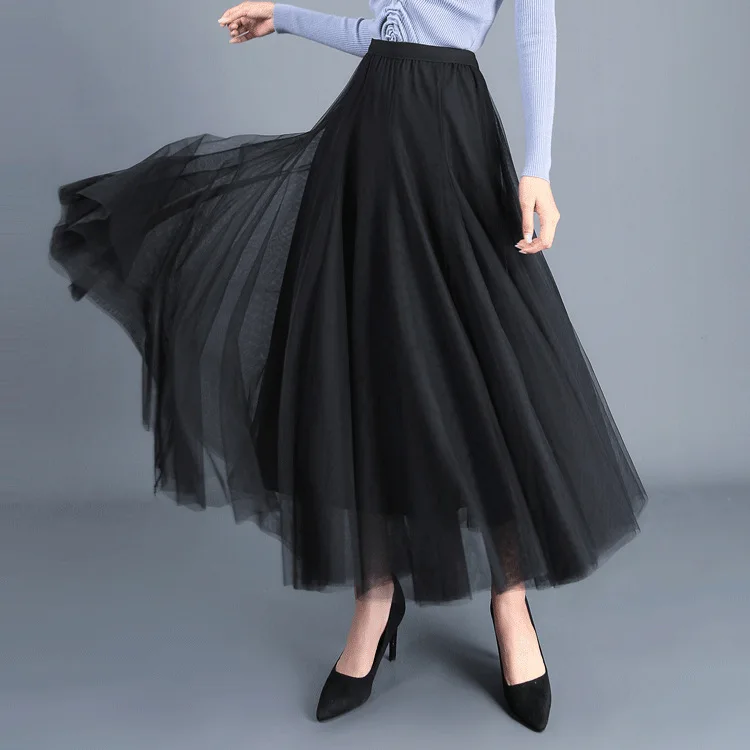 Classic solid color, simple temperament, elegant skirt, full of fourteen pieces of spliced two-layer gauze long skirt.