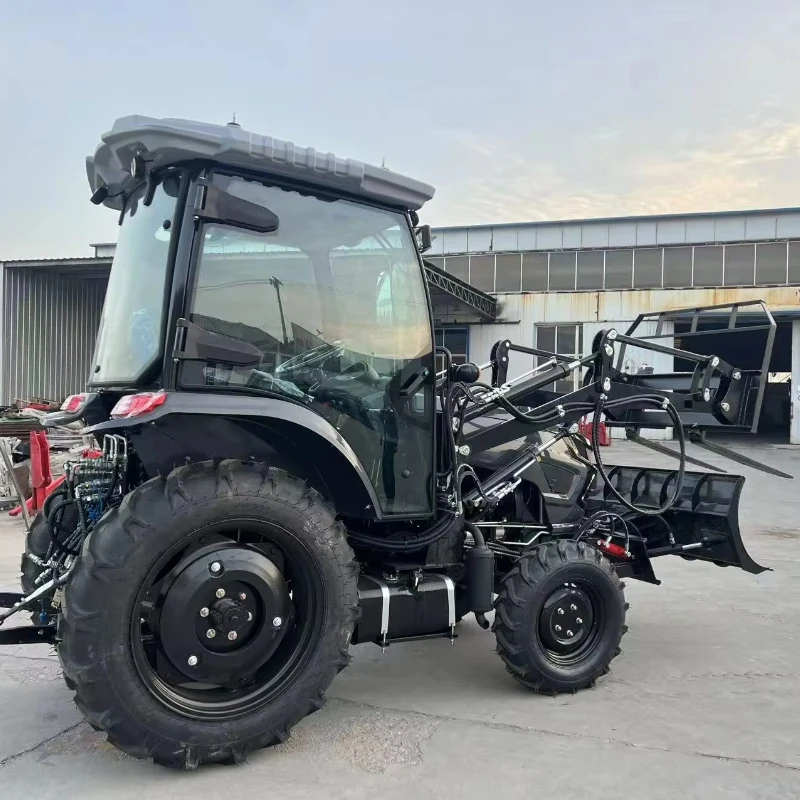 Фото Полноприводный мини-трактор 4x4 (4WD) 50-150 л.с. с кабиной для водителя, в комплекте с вилами для поддонов и снегоуборщиком, в продаже №5